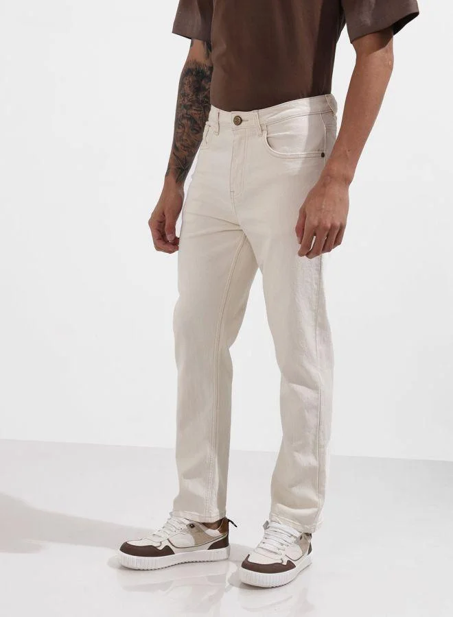 The Indian Garage Co  Men Slim Fit Solid Scoop Pocket Mid-Rise Jeans for Men | Best Price UAE